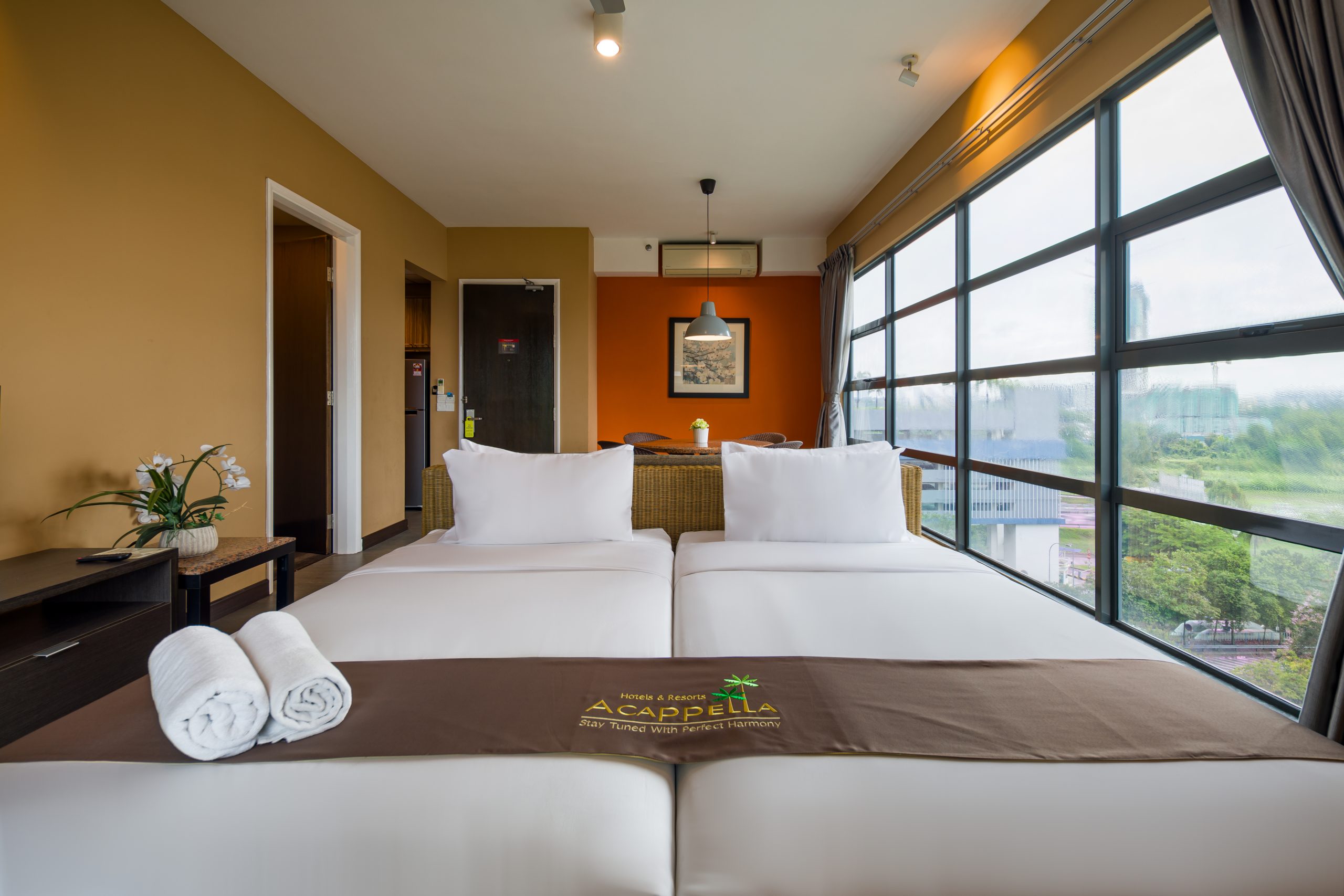 A modern suite hotel in Shah Alam featuring spacious rooms, warm contemporary interiors and lifestyle facilities. Photography highlights its design, ambiance and guest experience.